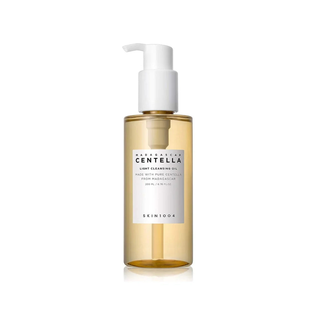 Skincare bottle with a white pump on a white background